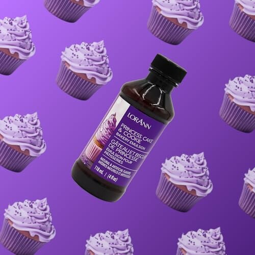 Bottle of cake flavor emulsion surrounded by cupcakes on purple background.