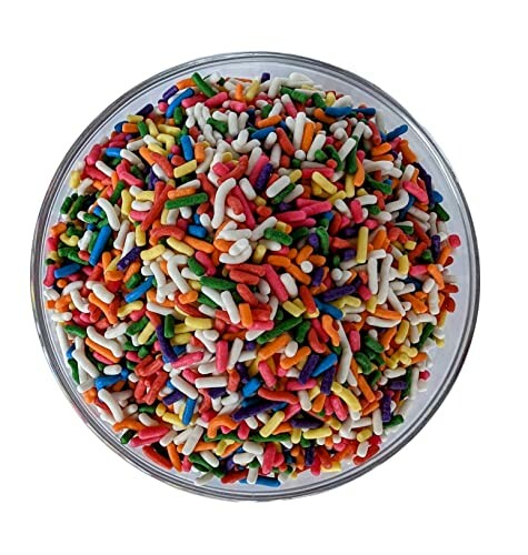 A bowl filled with colorful sprinkles.