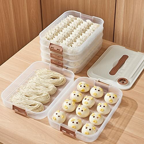 Plastic containers with noodles and cute animal-shaped buns.