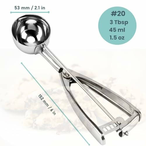 Stainless steel cookie scoop with measurements and capacity details.